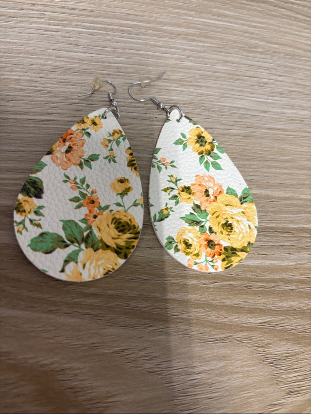 Plunder White Teardrop Earrings with Yellow & Green Floral Design